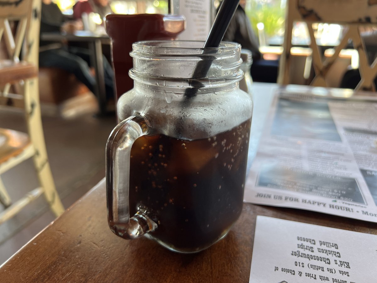 Broderick serves drinks in fun glass mugs